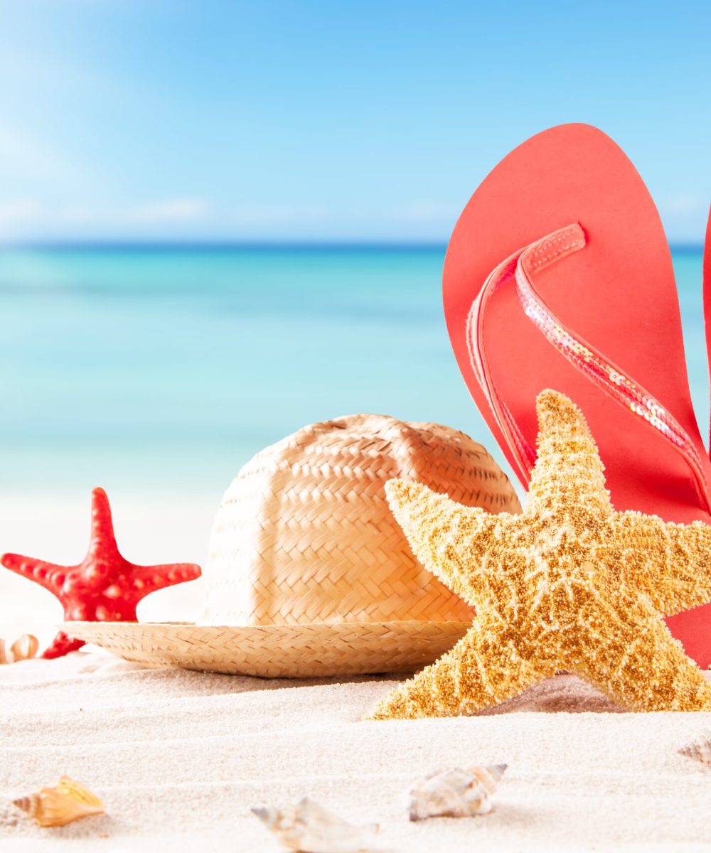 Summer,Concept,Of,Sandy,Beach,,Straw,Hat,,Shells,And,Starfish.